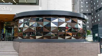 eclectic-building-refurbishment-with-facated-glass-appearance